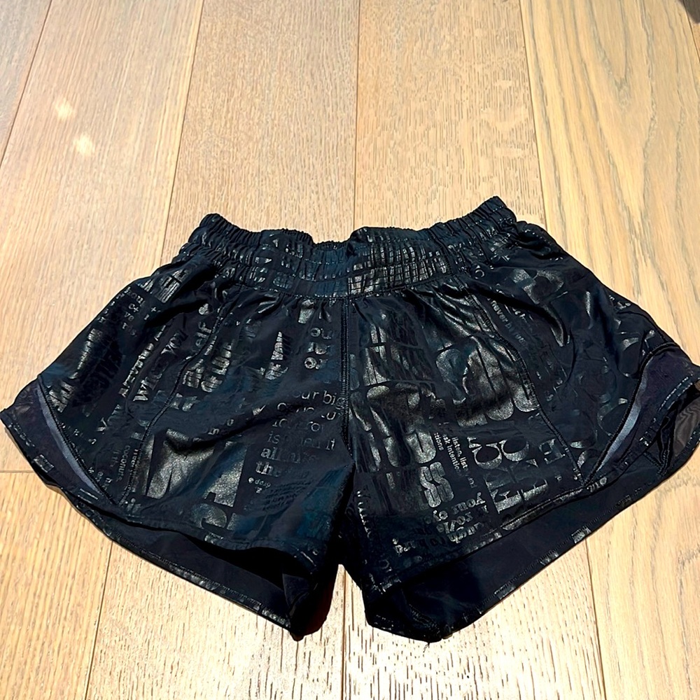 Lululemon hotty hot running short in black with chrome writing